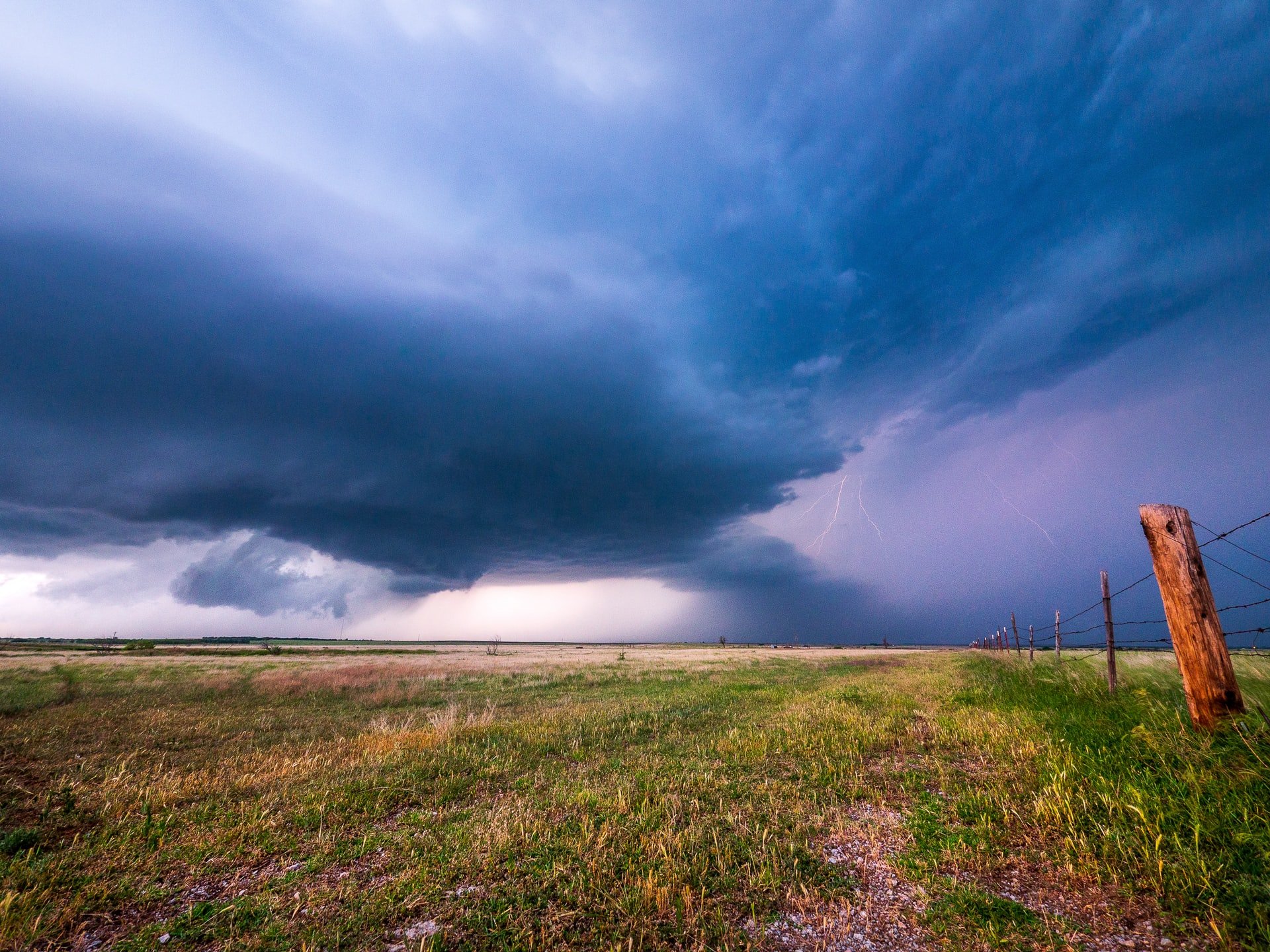 Super cell storm in rural Oklahoma. Photo by Raychel Sanner on Unsplash.